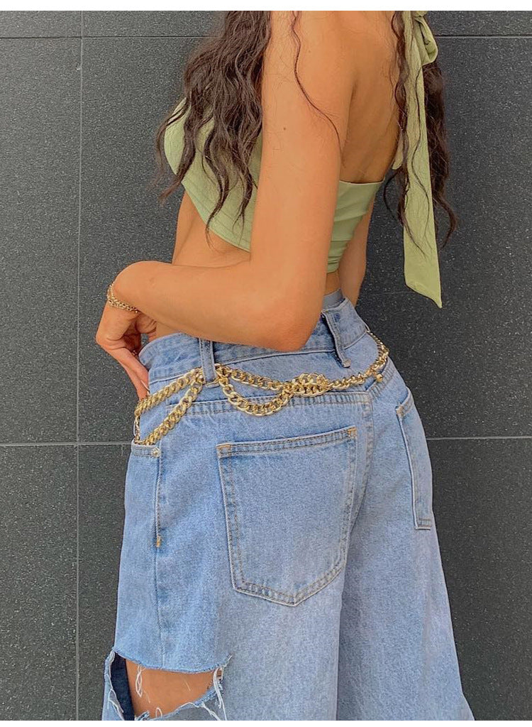 Loose Hole Jeans with Fashionable Oblique Waist Design for Style