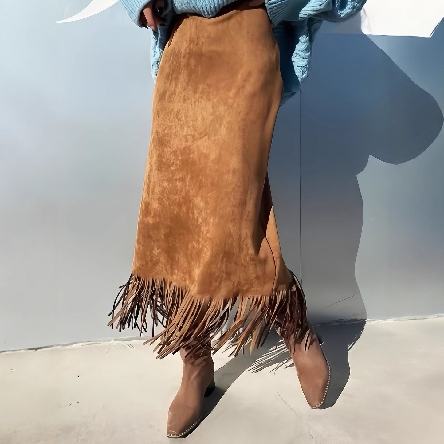 Suede Skirt with Tassel Detail for a Chic Mid-Length Look