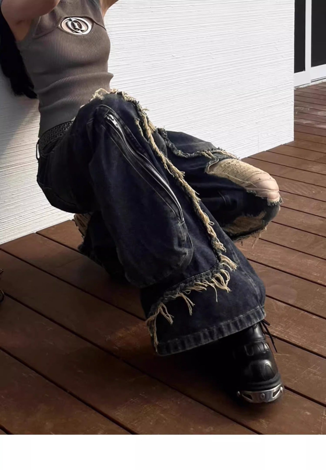 Ripped Jeans with Distressed Style and Big Pockets