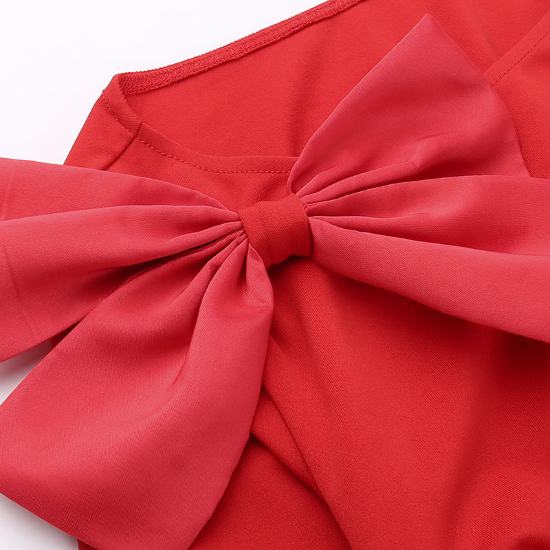 Slim-fit Sheath Dress with Bow Detail and Open Back Design